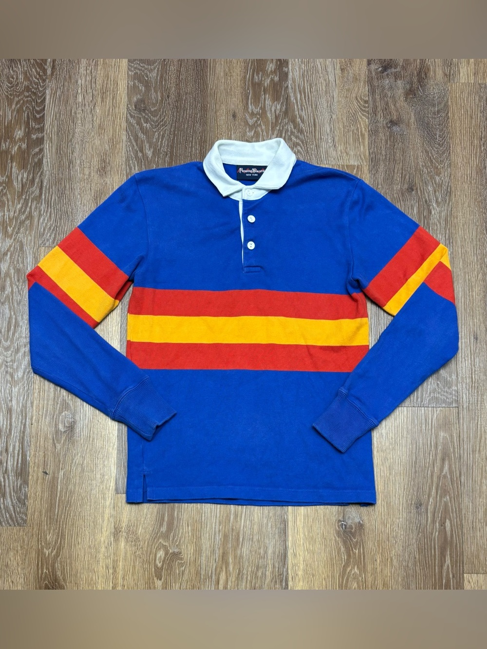 Rowing Blazers Blue Polo with Red Diamond Accent